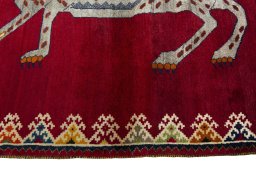 Close-up detail of 2000s Persian Gabbeh rug from Iran / Persia showing Wool weave