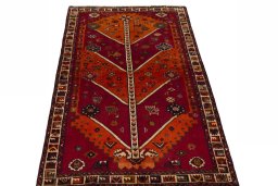 Surface texture of 2000s Persian Gabbeh rug with natural Wool and intricate pattern