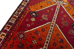 Backside of handmade 2000s Persian Gabbeh rug showing knot structure and weave density