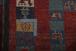 Close-up detail of New Persian Gabbeh rug from Iran / Persia showing Wool weave