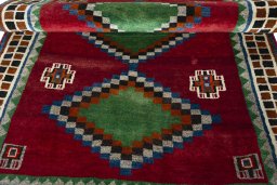 Full view of 2000s Persian Gabbeh rug from Iran / Persia, 198 × 124 cm in Red tones