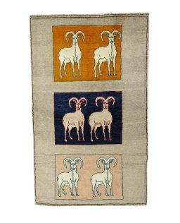 Full view of 2000s Persian Gabbeh rug from Iran / Persia, 170 × 106 cm in Beige tones