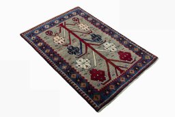 Close-up detail of 2000s Persian Gabbeh rug from Iran / Persia showing Wool weave