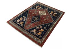 Corner detail of 2000s Persian Gabbeh rug showing border pattern and Wool pile