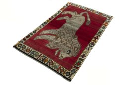 Corner detail of 2000s Persian Gabbeh rug showing border pattern and Wool pile