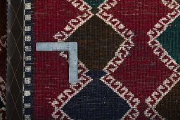 Close-up detail of 2000s Persian Gabbeh rug from Iran / Persia showing Wool weave