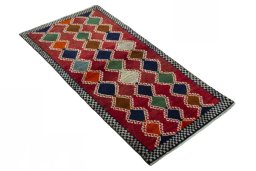 Close-up detail of 2000s Persian Gabbeh rug from Iran / Persia showing Wool weave
