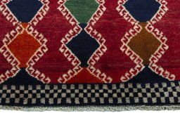 Central medallion detail of 2000s Persian Gabbeh rug from Iran / Persia