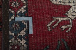 Close-up detail of 2000s Persian Gabbeh rug from Iran / Persia showing Wool weave