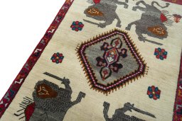 Backside of handmade 2000s Persian Gabbeh rug showing knot structure and weave density