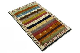 Close-up detail of 2000s Persian Gabbeh rug from Iran / Persia showing Wool weave