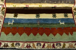 Close-up detail of 2000s Persian Gabbeh rug from Iran / Persia showing Wool weave