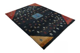 Close-up detail of 2000s Persian Gabbeh rug from Iran / Persia showing Wool weave
