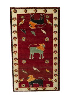 Full view of 2000s Persian Gabbeh rug from Iran / Persia, 234 × 134 cm in Red tones