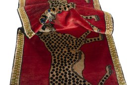 Corner detail of 2000s Persian Gabbeh rug showing border pattern and Wool pile