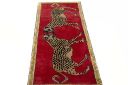 Surface texture of 2000s Persian Gabbeh rug with natural Wool and intricate pattern