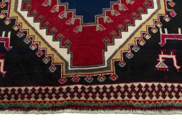 Central medallion detail of 2000s Persian Gabbeh rug from Iran / Persia