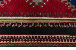 Close-up detail of 2000s Persian Gabbeh rug from Iran / Persia showing Wool weave