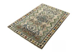 Corner detail of 2000s Persian Gabbeh rug showing border pattern and Wool pile