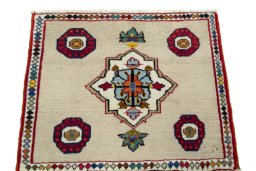 Surface texture of 2000s Persian Gabbeh rug with natural Wool and intricate pattern