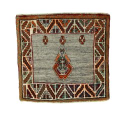 Full view of 2000s Persian Gabbeh rug from Iran / Persia, 60 × 62 cm in Red tones