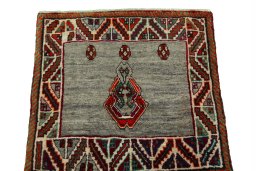 Surface texture of 2000s Persian Gabbeh rug with natural Wool and intricate pattern