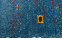 Close-up detail of 2000s Persian Gabbeh rug from Iran / Persia showing Wool weave