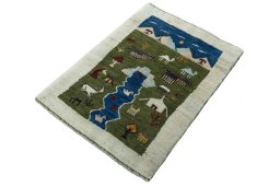 Corner detail of 2000s Persian Gabbeh rug showing border pattern and Wool pile