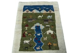 Surface texture of 2000s Persian Gabbeh rug with natural Wool and intricate pattern