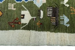 Close-up detail of 2000s Persian Gabbeh rug from Iran / Persia showing Wool weave