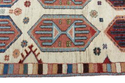 Close-up detail of 2000s Persian Gabbeh rug from Iran / Persia showing Wool weave