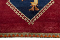 Central medallion detail of 2000s Persian Gabbeh rug from Iran / Persia