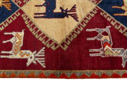 Close-up detail of 2000s Persian Gabbeh rug from Iran / Persia showing Wool weave
