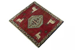 Corner detail of 2000s Persian Gabbeh rug showing border pattern and Wool pile