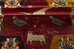 Full view of 2000s Persian Gabbeh rug from Iran / Persia, 200 × 123 cm in Red tones