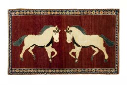 Full view of 2000s Persian Gabbeh rug from Iran / Persia, 178 × 105 cm in Red tones