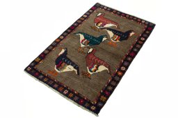 Corner detail of 2000s Persian Gabbeh rug showing border pattern and Wool pile
