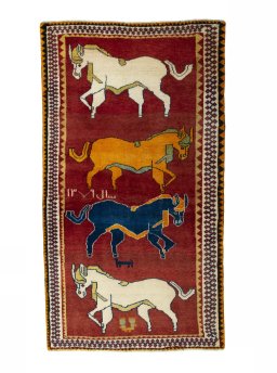Full view of 2000s Persian Gabbeh rug from Iran / Persia, 202 × 112 cm in Red tones