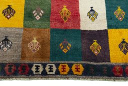 Central medallion detail of 2000s Persian Gabbeh rug from Iran / Persia