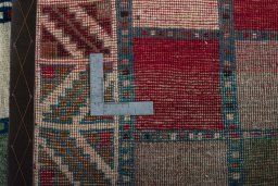 Close-up detail of 2000s Persian Gabbeh rug from Iran / Persia showing Wool weave
