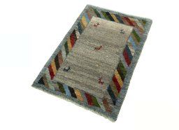 Corner detail of New Persian Gabbeh rug showing border pattern and Wool pile