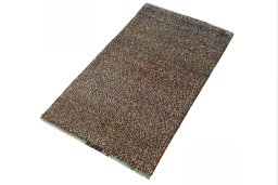 Corner detail of New Persian Gabbeh rug showing border pattern and Wool pile