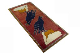 Close-up detail of 2000s Persian Gabbeh rug from Iran / Persia showing Wool weave