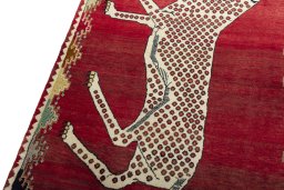 Backside of handmade 2000s Persian Gabbeh rug showing knot structure and weave density