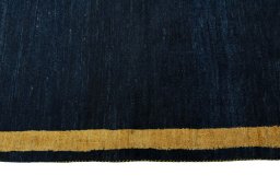 Close-up detail of New Persian Gabbeh rug from Iran / Persia showing Wool weave