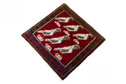 Corner detail of 2000s Persian Gabbeh rug showing border pattern and Wool pile