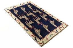 Close-up detail of 2000s Persian Gabbeh rug from Iran / Persia showing Wool weave