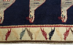 Central medallion detail of 2000s Persian Gabbeh rug from Iran / Persia