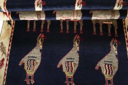 Full view of 2000s Persian Gabbeh rug from Iran / Persia, 188 × 112 cm in Blue tones