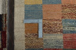 Close-up detail of 2000s Persian Gabbeh rug from Iran / Persia showing Wool weave